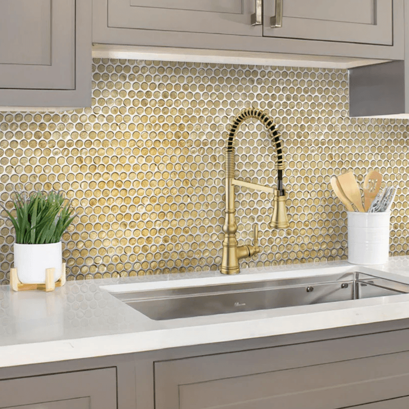 Gold penny tile backsplash