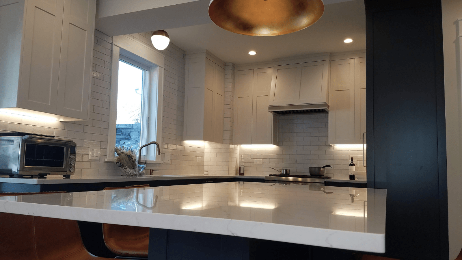 Fireclay tile backsplash after