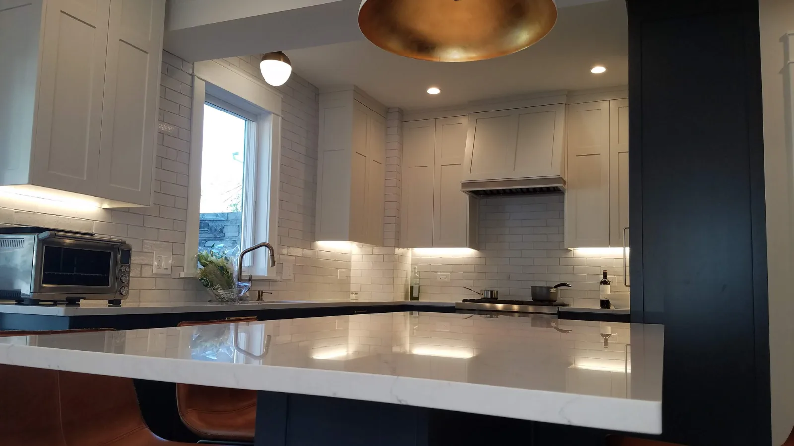Fireclay tile backsplash after