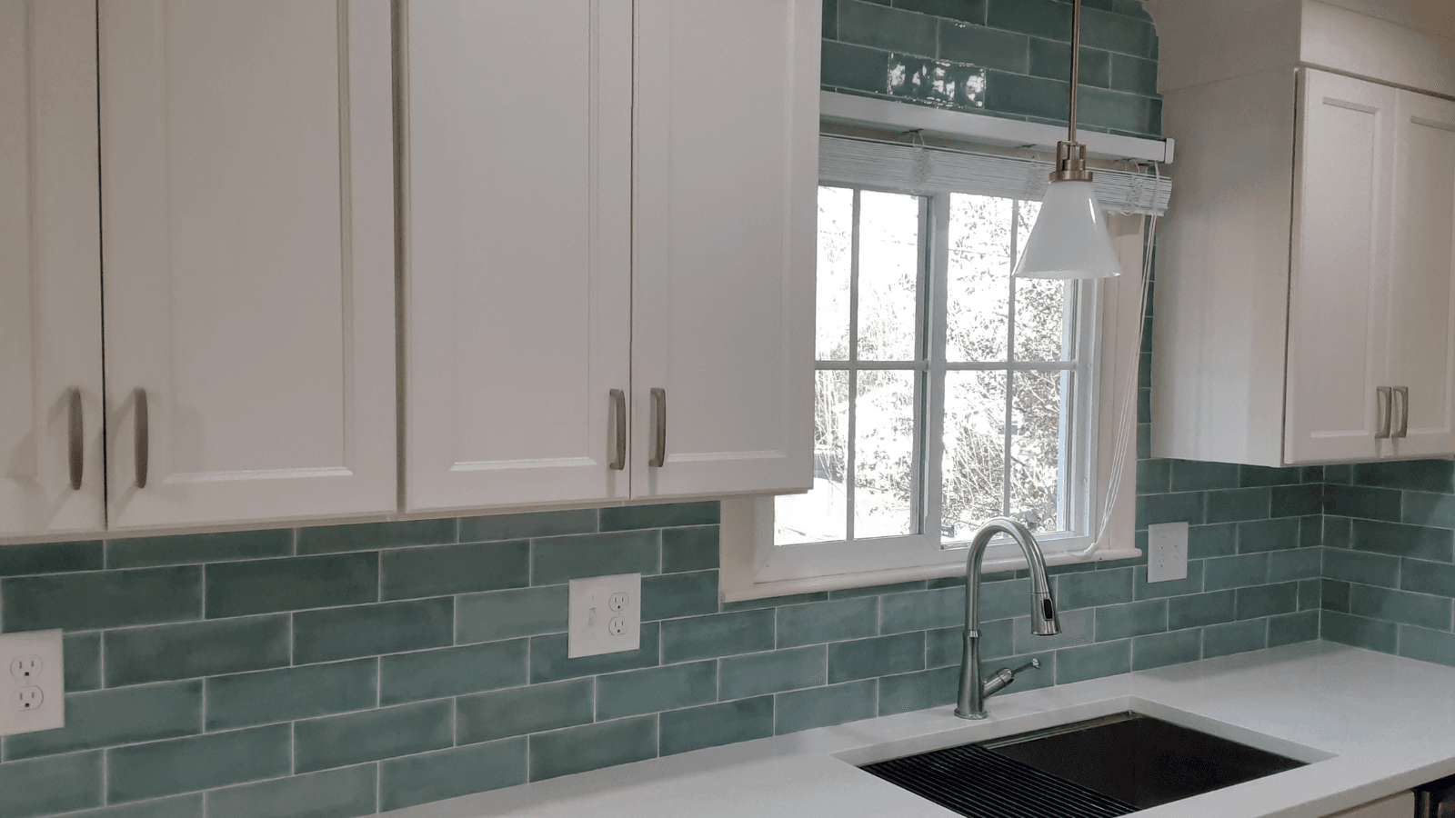 Green subway tile backsplash after