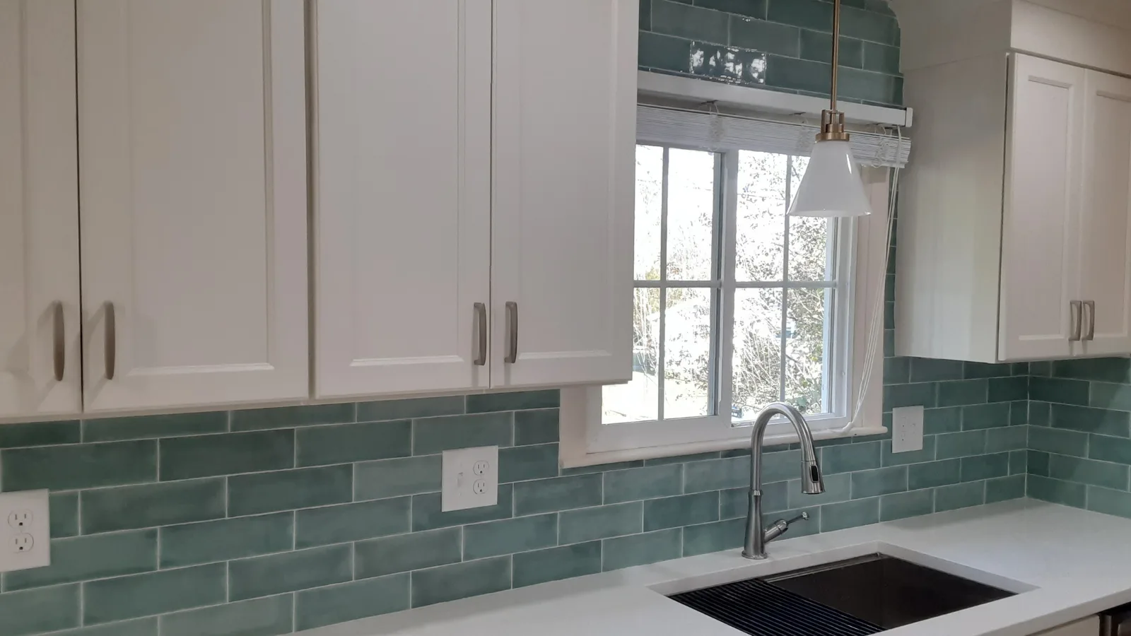 Green subway tile backsplash after