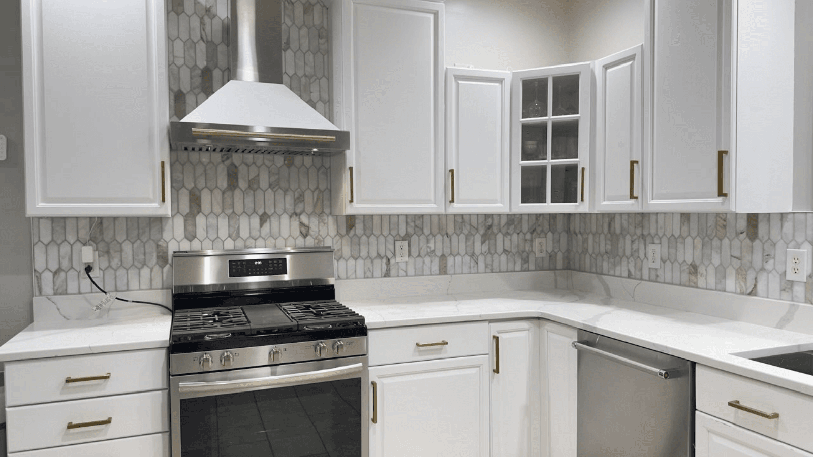 Marble tile picket backsplash after