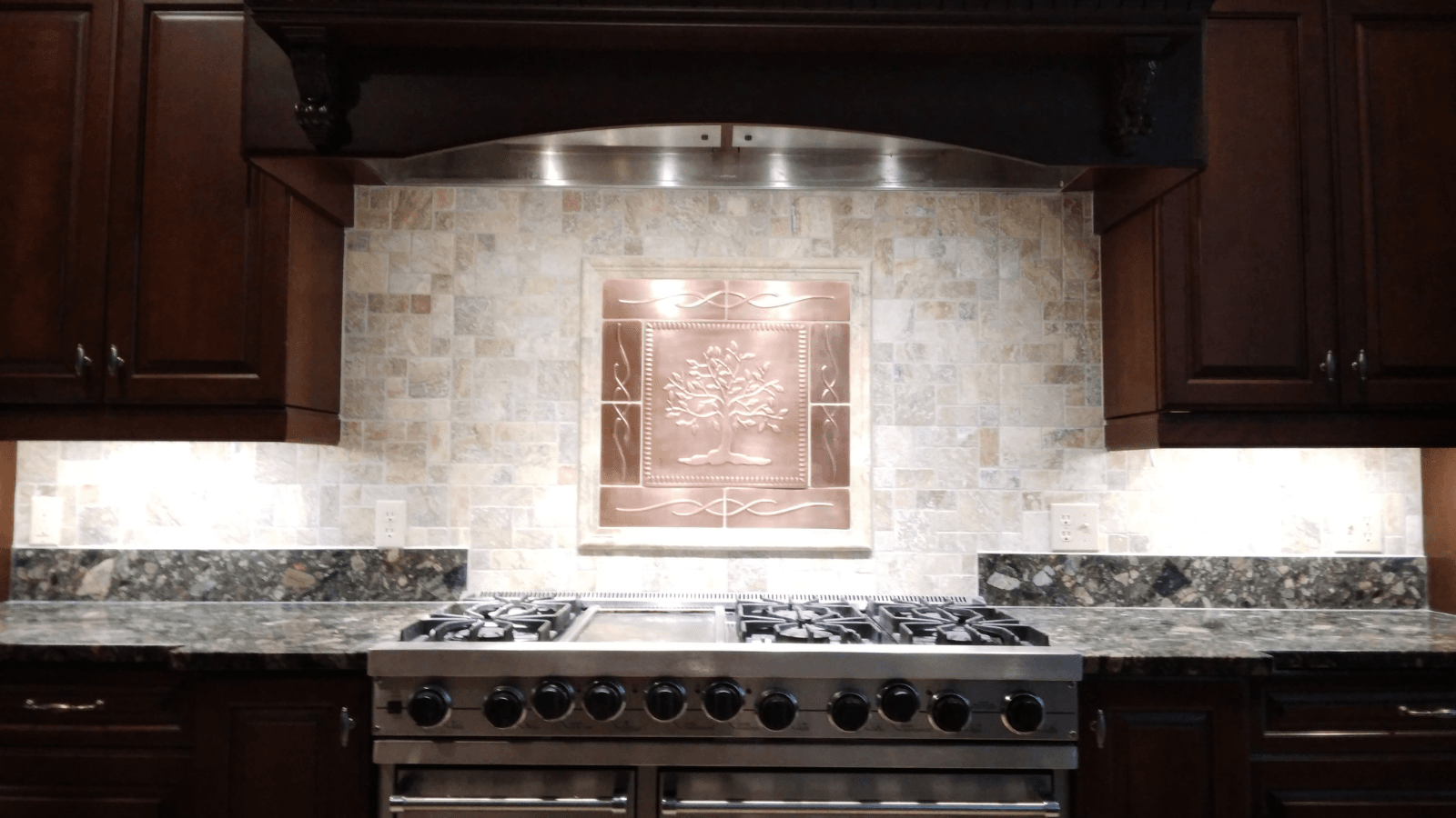 Travertine tile backsplash after