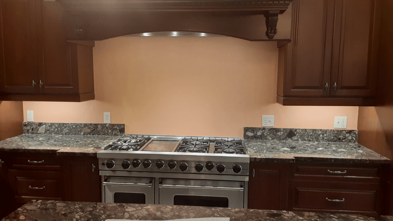 Travertine tile backsplash before