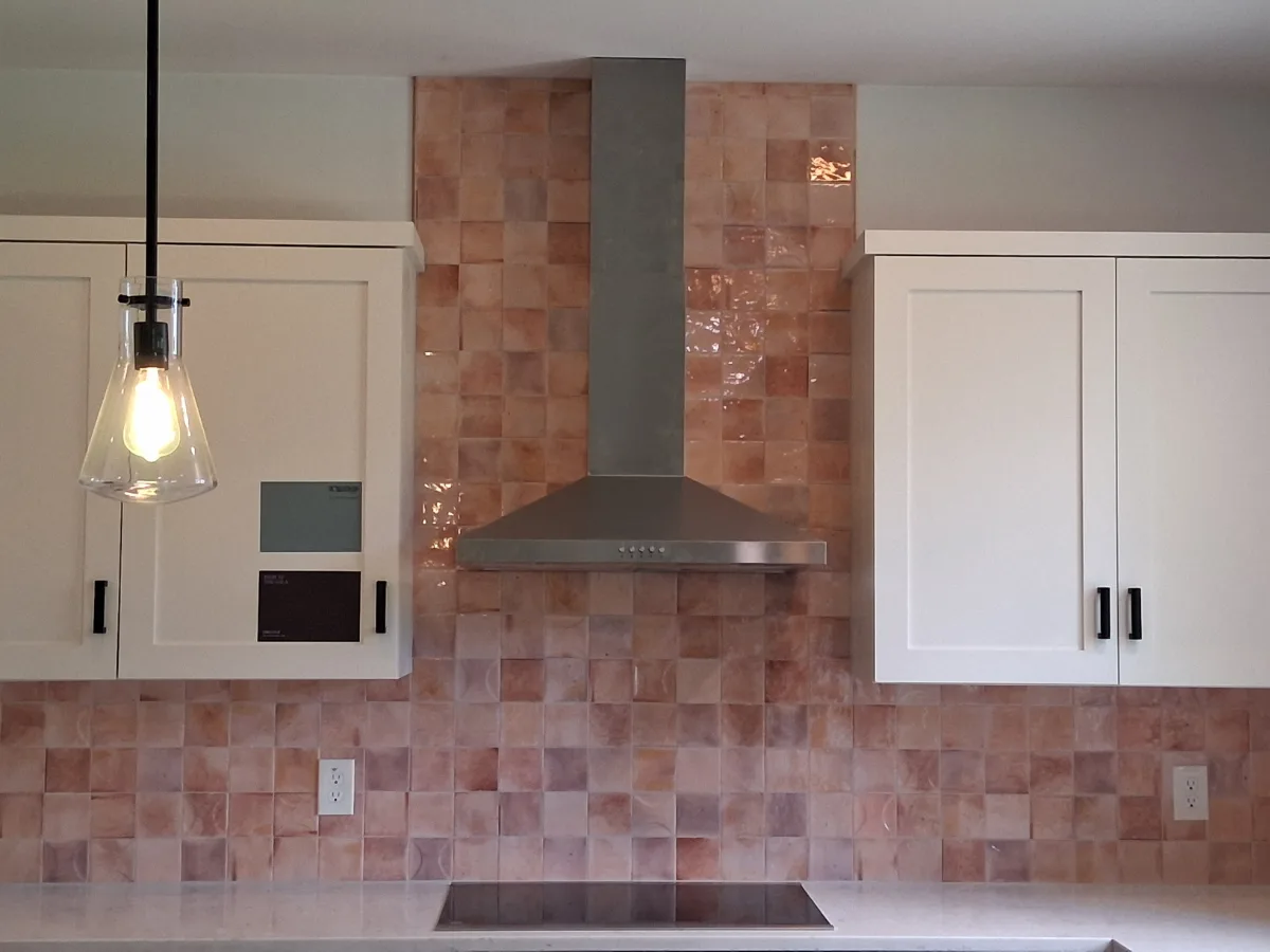 Zellige tile backsplash with light gray grout