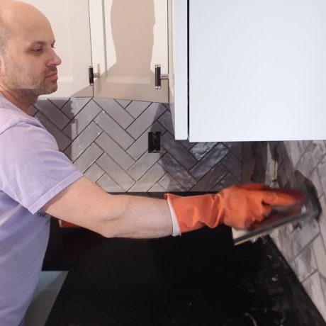 Grouting a herringbone style tile backsplash