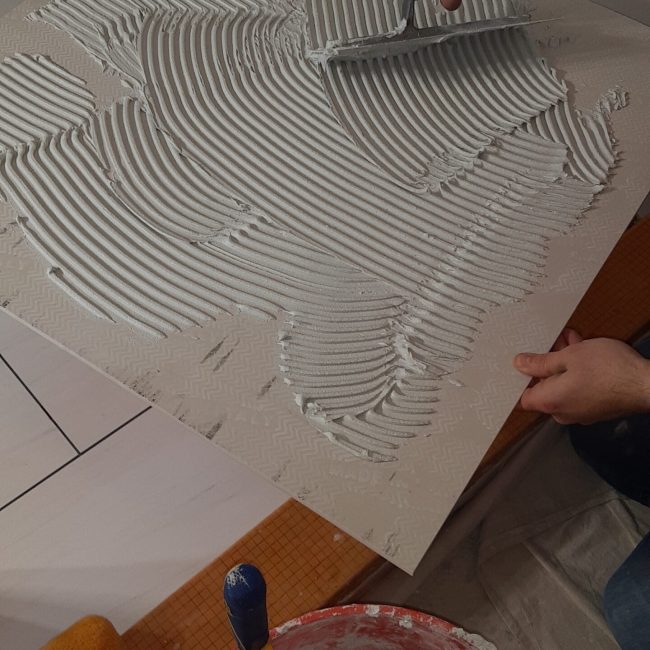 Tile buttering Tile buttering