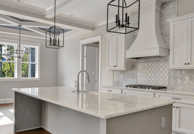 White marble kitchen countertops and backsplash White marble kitchen countertops and backsplash