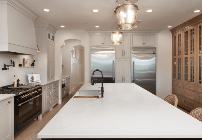 White quartz countertops with variegated grey veining White quartz countertops with variegated grey veining