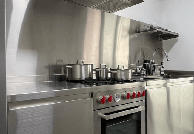 Modern kitchen featuring stainless steel countertops Modern kitchen featuring stainless steel countertops